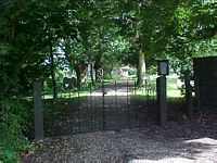 Church gate with the path leading to the church.