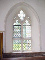 South window of the chancel near the organ.